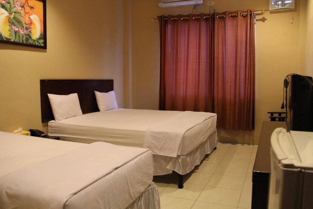 Hotel Sing A Song Pematangsiantar Rum bild