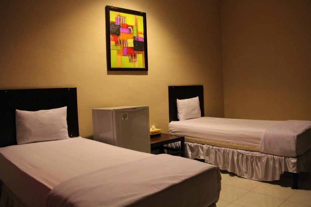 Hotel Sing A Song Pematangsiantar Rum bild