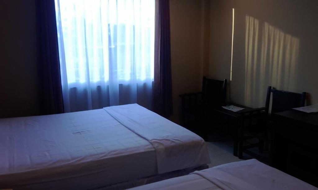 Hotel Sing A Song Pematangsiantar Rum bild
