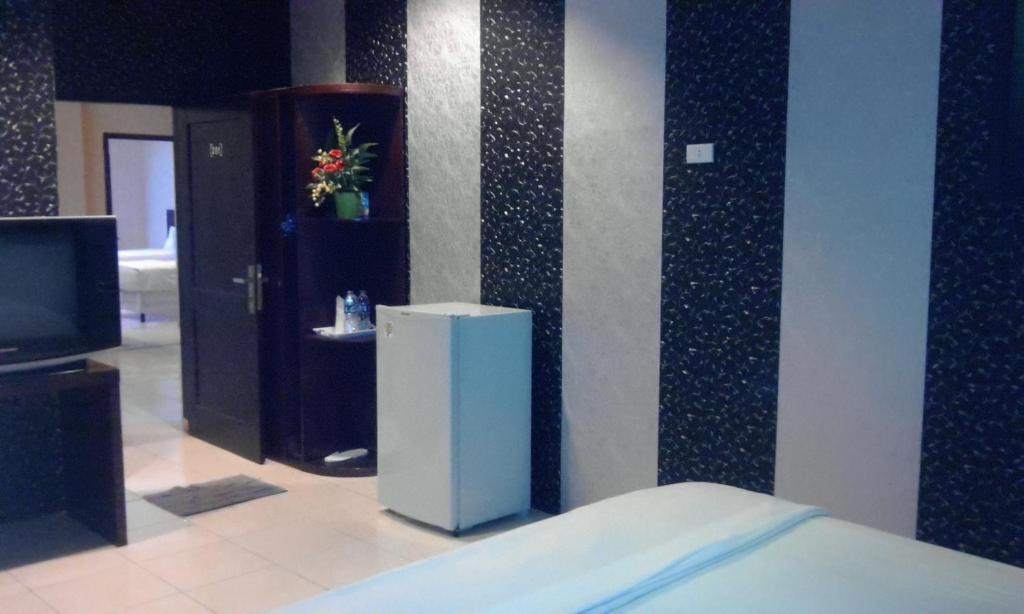 Hotel Sing A Song Pematangsiantar Rum bild